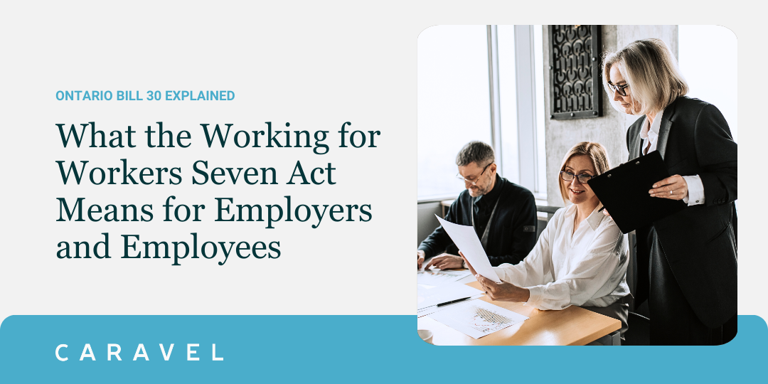 People smiling and looking at work materials